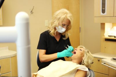 Hygienist with Patient